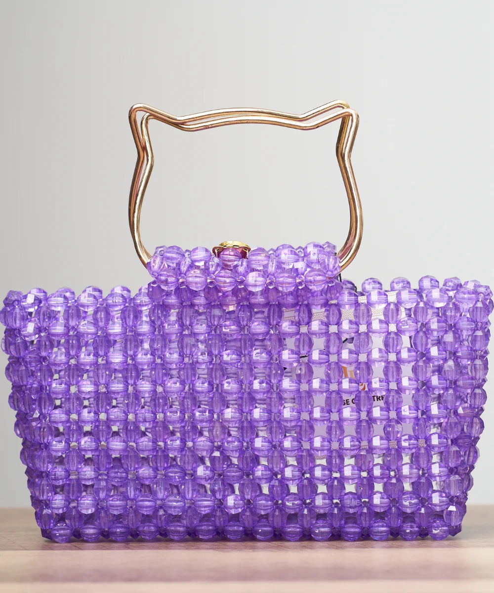 Handcrafted Beaded Tote Bag with Sculpted Metal Handle