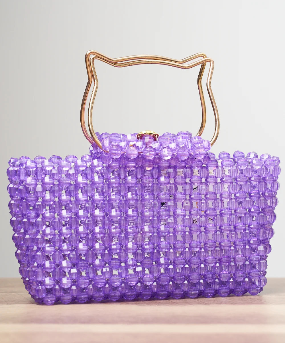 Handcrafted Beaded Tote Bag with Sculpted Metal Handle