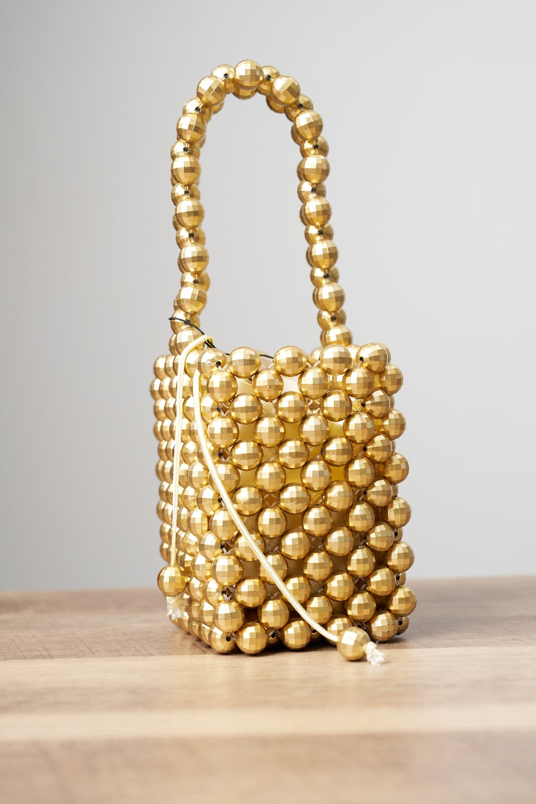 Beaded gold bag