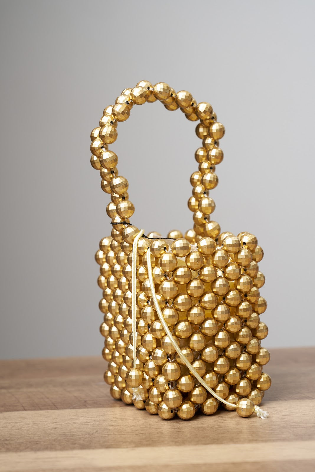 Beaded gold bag